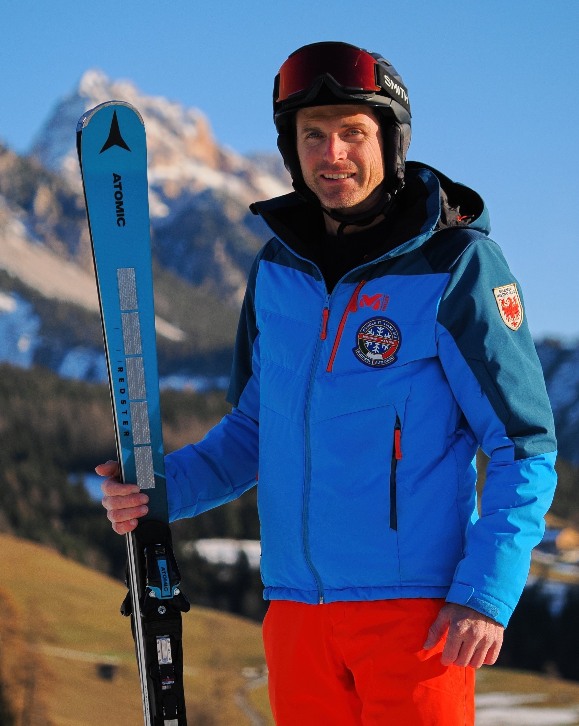Lois Willeit, certified ski instructor, on an alpine terrace in the Dolomites