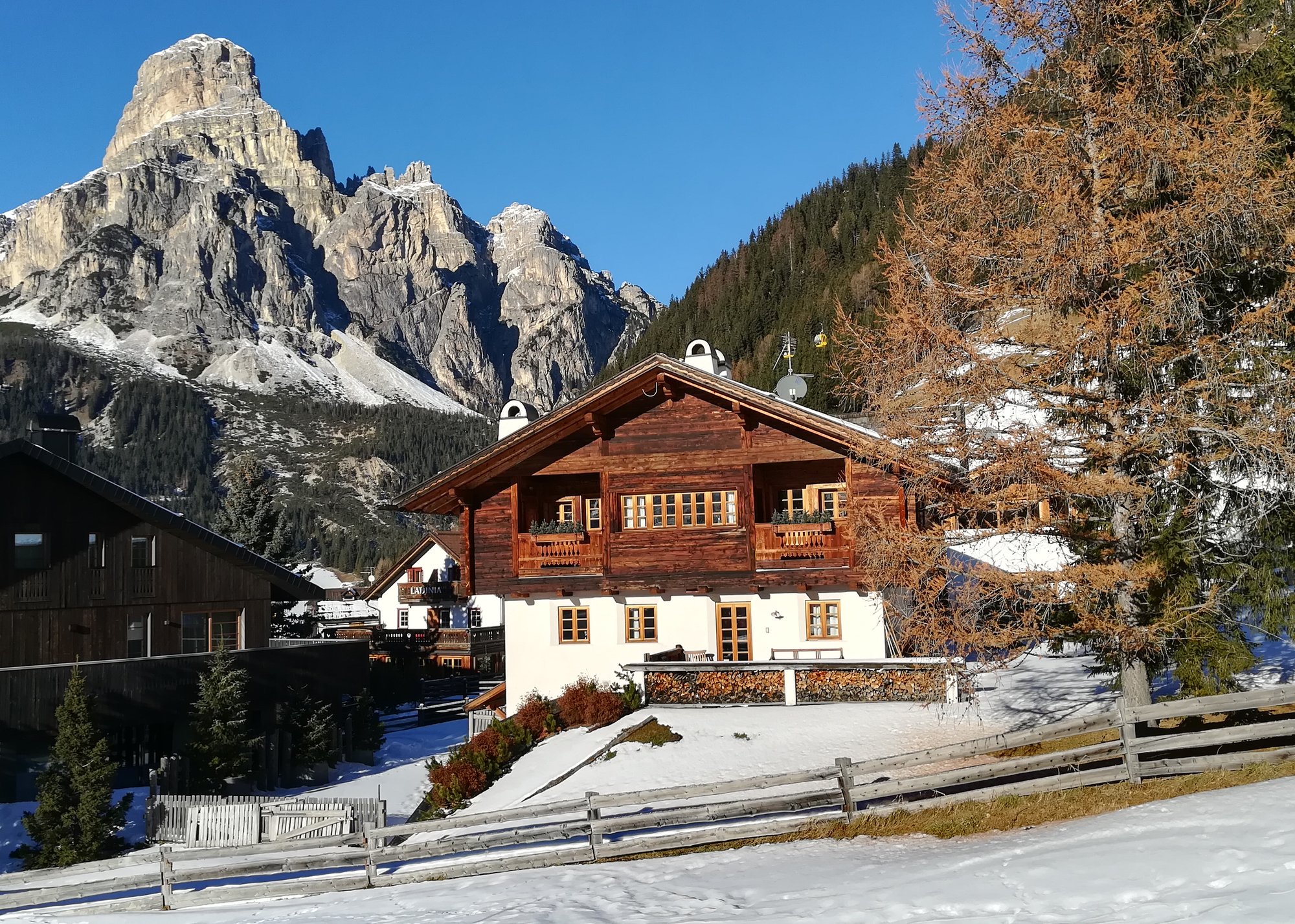 Snow covered valley run beneath the Lagazuoi rock faces in winter light